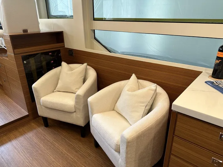  Yacht Photos Pics Interior of 2026 Outback Yachts Outback 50 with cozy seating and modern design.
