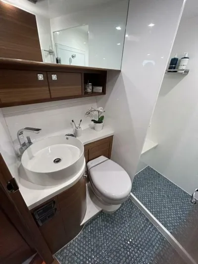  Yacht Photos Pics Modern bathroom in 2026 Outback Yachts Outback 50, featuring sleek fixtures and elegant design.