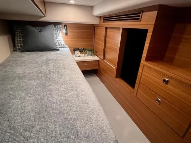  Yacht Photos Pics Luxurious cabin interior of 2026 Outback Yachts Outback 50 with modern wood finish.