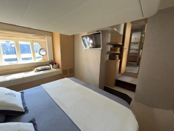  Yacht Photos Pics Luxurious cabin interior of 2011 Ferretti Yachts 570 with modern amenities.