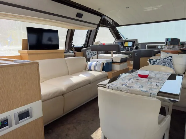  Yacht Photos Pics Luxurious interior of a 2011 Ferretti Yachts 570 with modern furnishings and elegant decor.