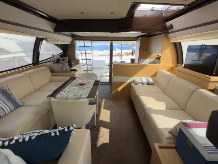  Yacht Photos Pics Luxurious interior of a 2011 Ferretti Yachts 570 with elegant seating and ocean view.