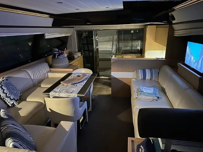  Yacht Photos Pics Luxurious interior of 2011 Ferretti Yachts 570 with elegant seating and modern decor.