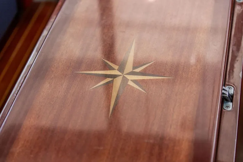 Marina Yacht Photos Pics Polished wooden surface with star inlay on 2008 Huckins Linwood boat.