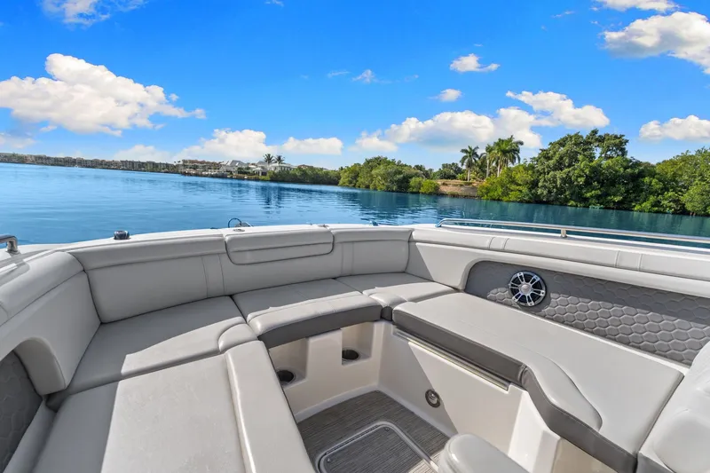  Yacht Photos Pics Interior of 2021 Sea Ray SDX 290 Outboard on calm waters.