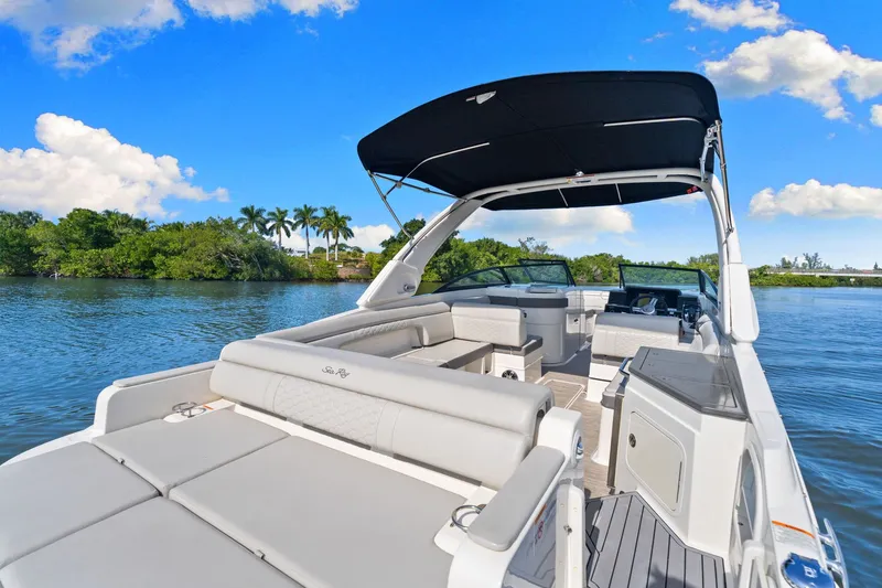  Yacht Photos Pics 2021 Sea Ray SDX 290 Outboard on calm waters.
