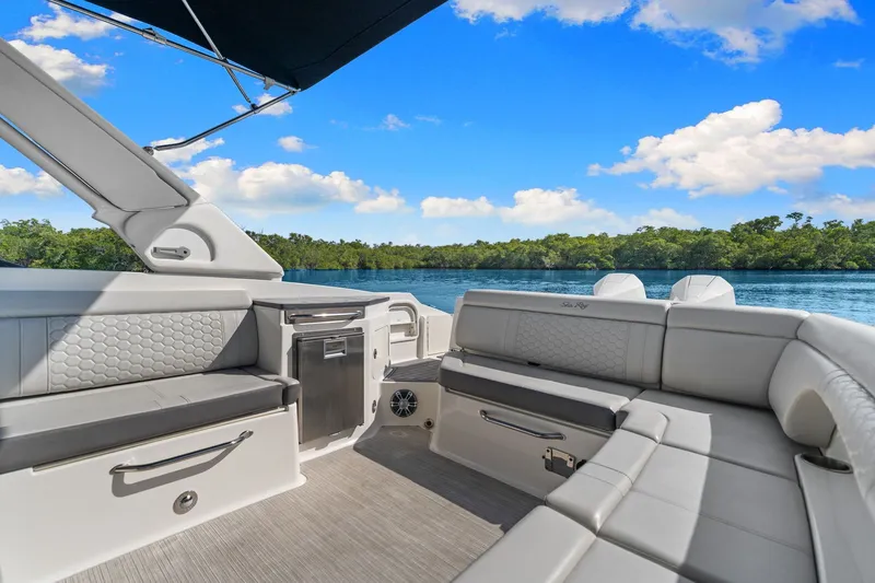  Yacht Photos Pics Interior of 2021 Sea Ray SDX 290 Outboard on calm waters.