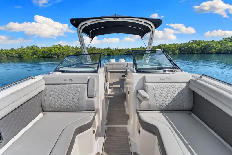  Yacht Photos Pics Interior view of 2021 Sea Ray SDX 290 Outboard on calm water.