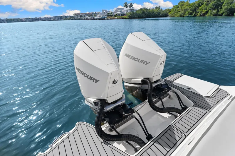  Yacht Photos Pics 2021 Sea Ray SDX 290 Outboard with Mercury engines on calm water.