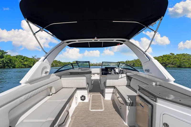  Yacht Photos Pics Interior of 2021 Sea Ray SDX 290 Outboard on calm waters.