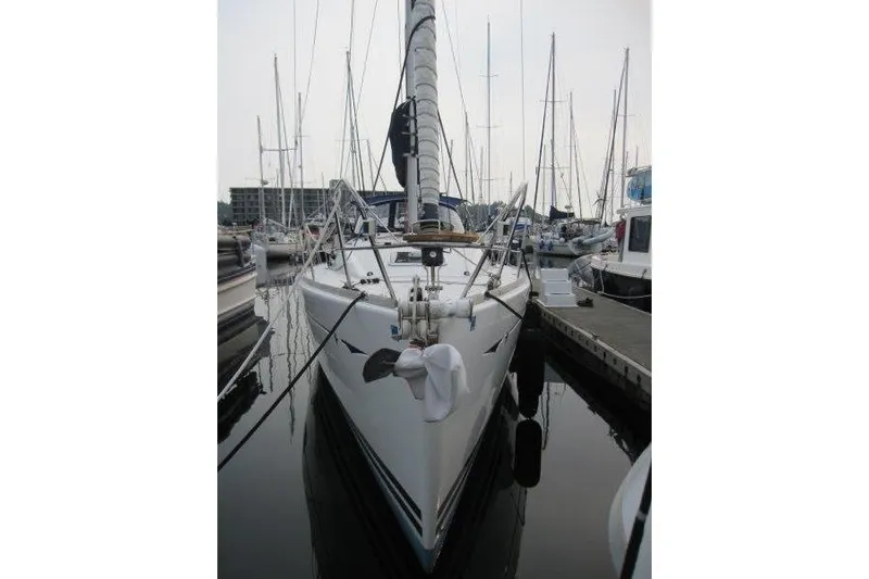Angelucia Yacht Photos Pics 2008 Jeanneau Sun Odyssey 39i sailboat docked in a marina, front view.
