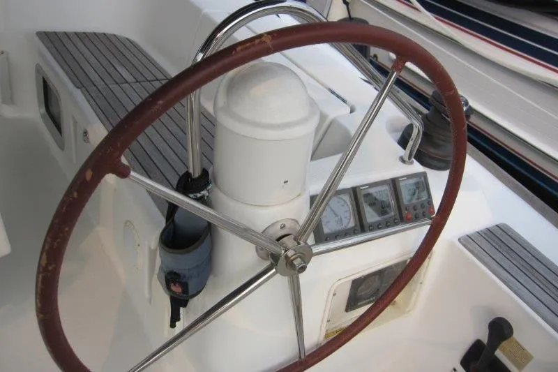 Angelucia Yacht Photos Pics Steering wheel and controls of 2008 Jeanneau Sun Odyssey 39i sailboat cockpit.