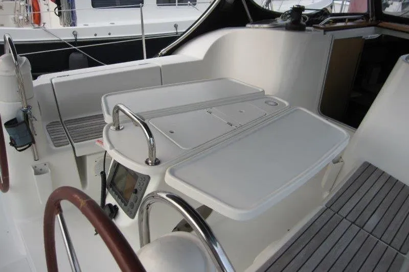 Angelucia Yacht Photos Pics Cockpit of 2008 Jeanneau Sun Odyssey 39i sailboat with dual steering wheels and navigation equipment.