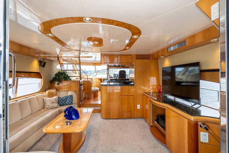 Royal Viking Yacht Photos Pics Luxurious interior of 1999 Vitech 68' Pilothouse yacht with elegant wood finishes and modern amenities.