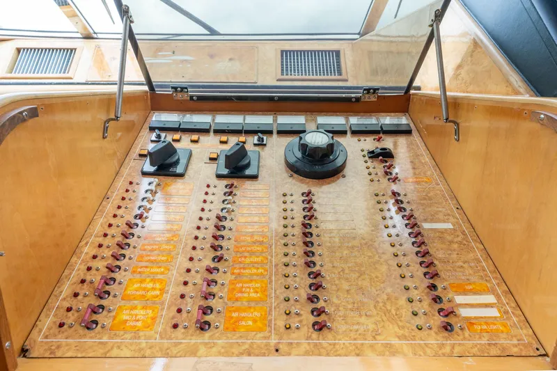 Royal Viking Yacht Photos Pics Control panel of 1999 Vitech 68' Pilothouse yacht, featuring switches and dials.