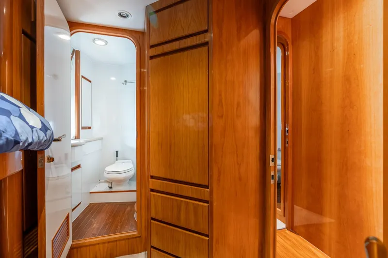 Royal Viking Yacht Photos Pics Luxurious wooden interior of 1999 Vitech 68' Pilothouse yacht bathroom.