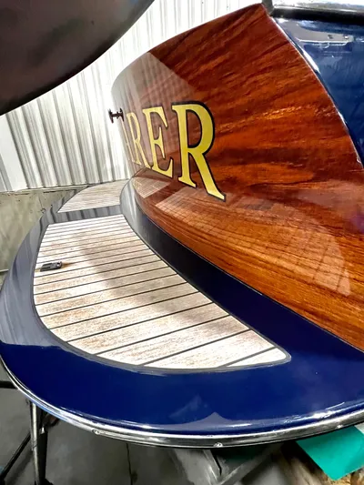 Wayfarer Yacht Photos Pics 2002 Hinckley Talaria 29C boat with polished wood and sleek design.