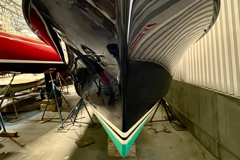 Wayfarer Yacht Photos Pics 2002 Hinckley Talaria 29C boat hull in storage, showcasing sleek design and craftsmanship.