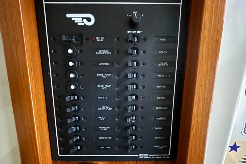 Wayfarer Yacht Photos Pics Control panel of a 2002 Hinckley Talaria 29C boat with various switches and indicators.