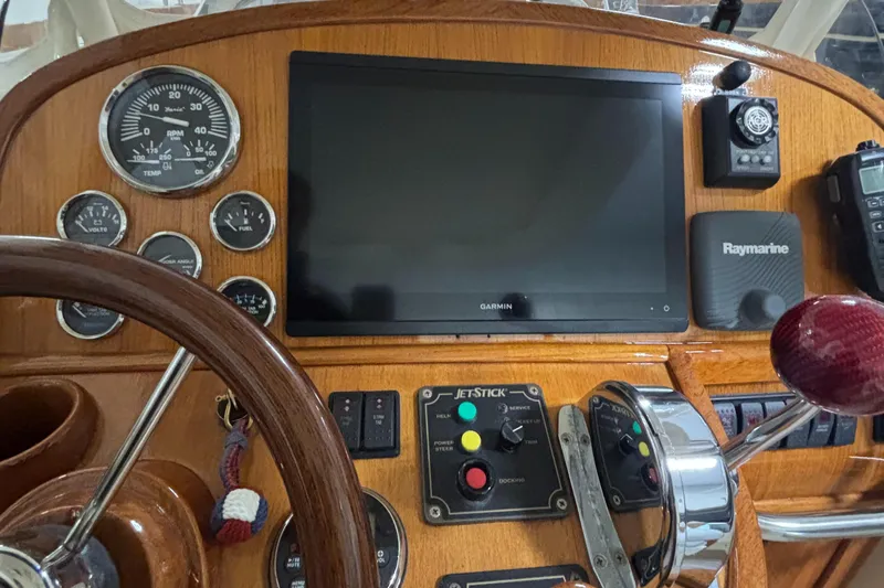 Wayfarer Yacht Photos Pics Hinckley Talaria 29C 2002 dashboard with Garmin and Raymarine navigation systems.