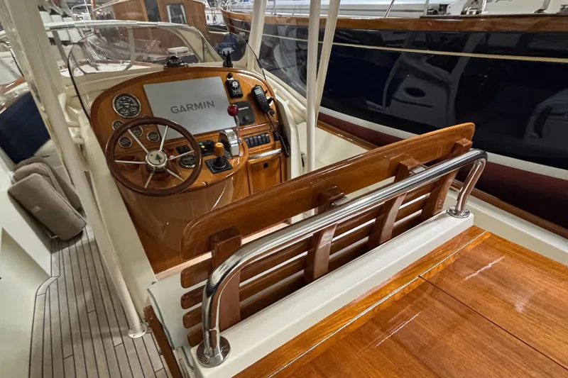 Wayfarer Yacht Photos Pics Helm of 2002 Hinckley Talaria 29C with Garmin navigation system and wooden accents.