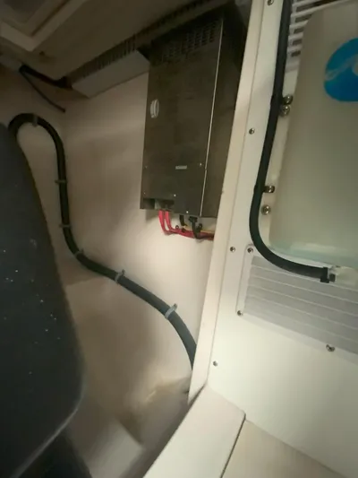 Arbutus Yacht Photos Pics Engine room of 2006 Cabo 32 Express HT with electrical components and wiring.