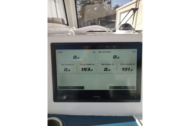  Yacht Photos Pics Garmin display on 2023 Tidewater 292 CC Adventure showing trip and fuel data.