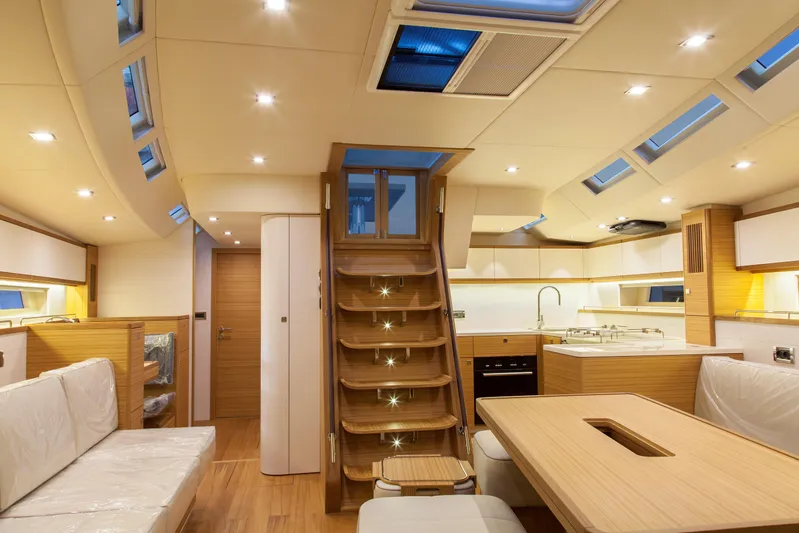  Yacht Photos Pics Luxurious interior of 2026 Mazarin 72 Cruiser/Racer yacht with modern design and ambient lighting.