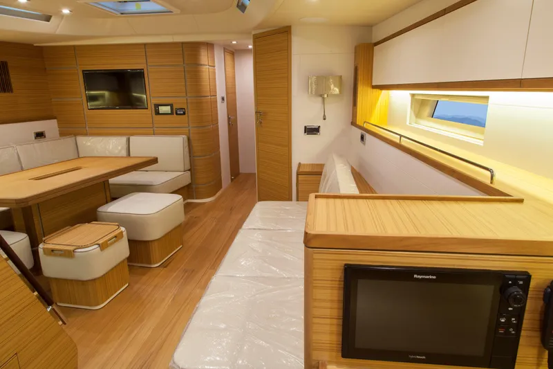  Yacht Photos Pics Luxurious interior of 2026 Mazarin 72 Cruiser/Racer Gen II yacht with modern furnishings.