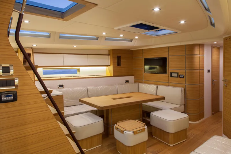  Yacht Photos Pics Luxurious interior of 2026 Mazarin 72 Cruiser/Racer yacht with modern seating and lighting.