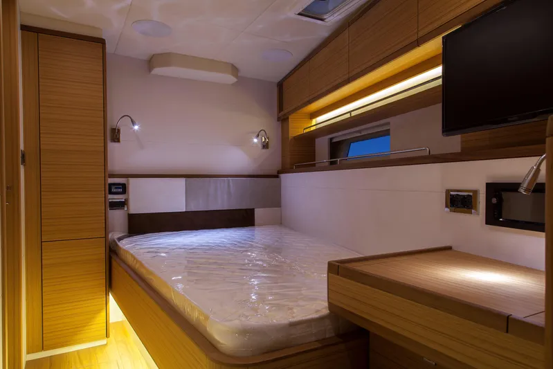  Yacht Photos Pics Luxurious interior of 2026 Mazarin 72 Cruiser/Racer Gen II with modern wood finishes.