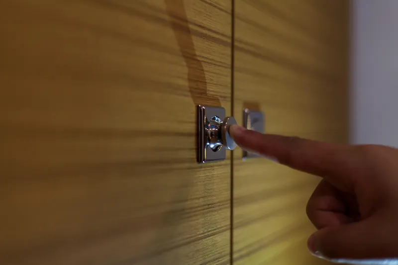  Yacht Photos Pics Finger pressing button on wooden panel, Mazarin 72 Cruiser/Racer Gen II, 2026.