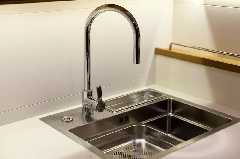  Yacht Photos Pics Modern stainless steel sink and faucet in Mazarin 72 Cruiser/Racer yacht, 2026 model.