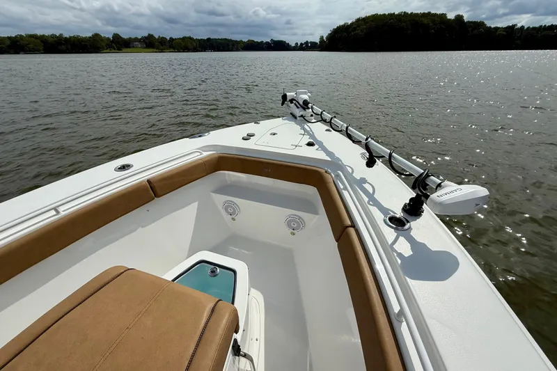  Yacht Photos Pics 2021 Sea Hunt Gamefish 27 Coffin Box boat on a calm lake.