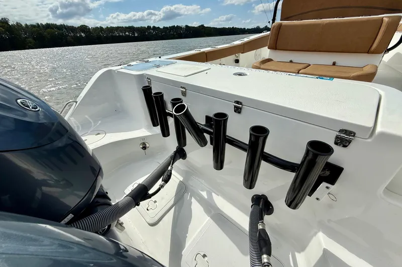  Yacht Photos Pics 2021 Sea Hunt Gamefish 27 Coffin Box boat with rod holders and seating on a sunny day.