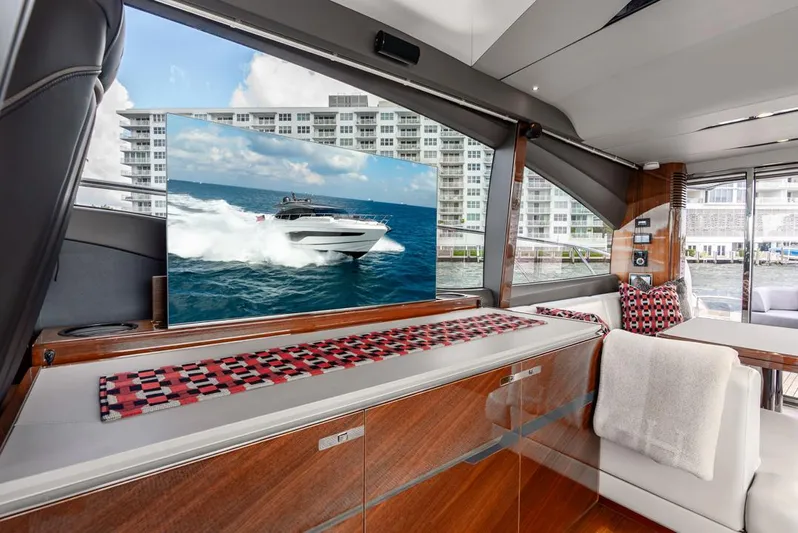Fly By Yacht Photos Pics Luxurious interior of 2019 Princess V65 yacht with ocean view and modern amenities.