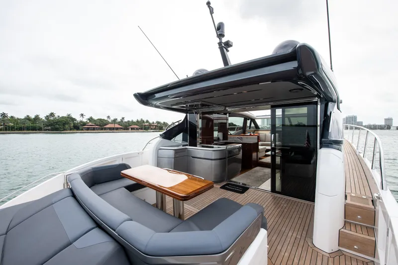 Fly By Yacht Photos Pics Luxurious 2019 Princess V65 yacht with spacious deck and modern interior.