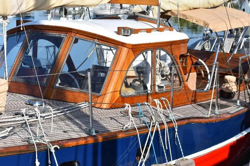 Vintage 1958 Custom Steel Motorsailor with wooden cabin and rigging details.