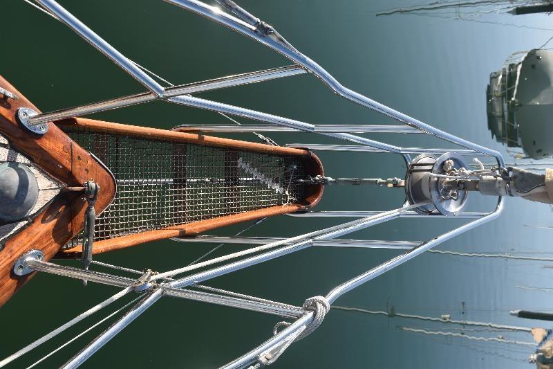 Bow of 1958 Custom Steel Motorsailor with wooden and metal details.