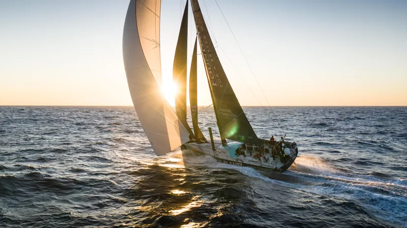 Yacht Photos Pics Sailing yacht Farr Volvo Ocean 65, 2014, at sunset on open sea.