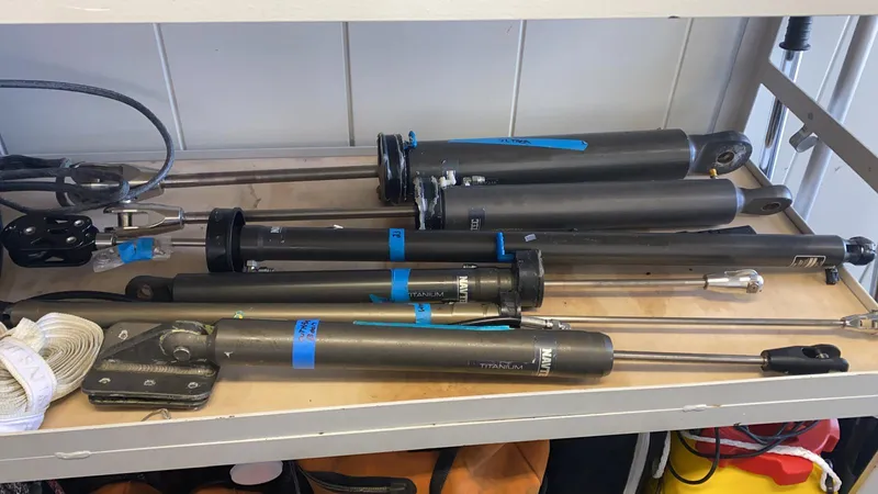  Yacht Photos Pics Spare parts for Farr Volvo Ocean 65 yacht, neatly arranged on a shelf.