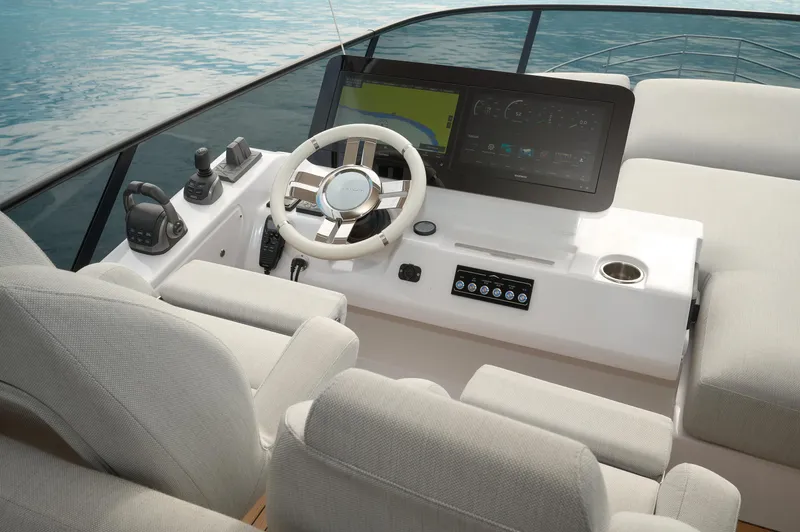  Yacht Photos Pics 2023 Azimut 53 yacht helm with modern controls and navigation system.