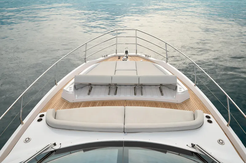  Yacht Photos Pics 2023 Azimut 53 yacht bow with luxurious seating and ocean view.