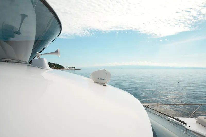  Yacht Photos Pics 2023 Azimut 53 yacht on calm sea under clear sky.