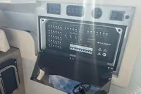 Control panel of 2022 Saxdor 320 GTC boat, featuring various switches and indicators.
