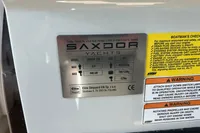 Plaque on 2022 Saxdor 320 GTC yacht displaying specifications and safety warnings.