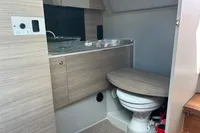 Modern bathroom in 2022 Saxdor 320 GTC boat with sleek design and compact amenities.