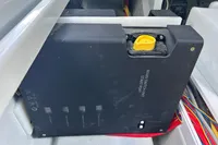 Electrical component in a 2022 Saxdor 320 GTC boat, featuring wiring and a control unit.