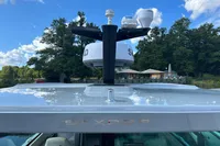 2022 Saxdor 320 GTC boat with radar equipment, set against a scenic outdoor backdrop.