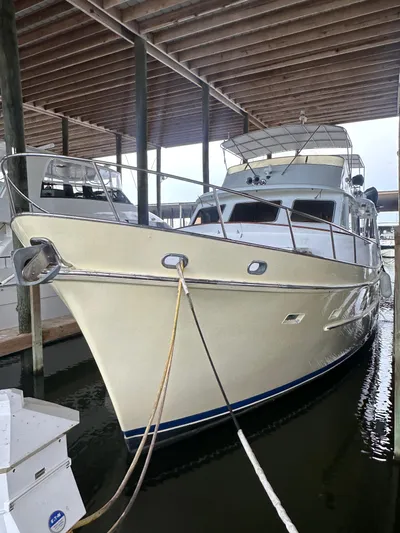 Ranger Yacht Photos Pics 1986 Cheoy Lee 66 Long Range Motor Yacht docked under shelter.